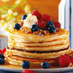 Ricotta Pancakes with Berries & Lemon Honey Sauce