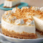 Creamy Coconut Cheesecake with Toasted Coconut Topping