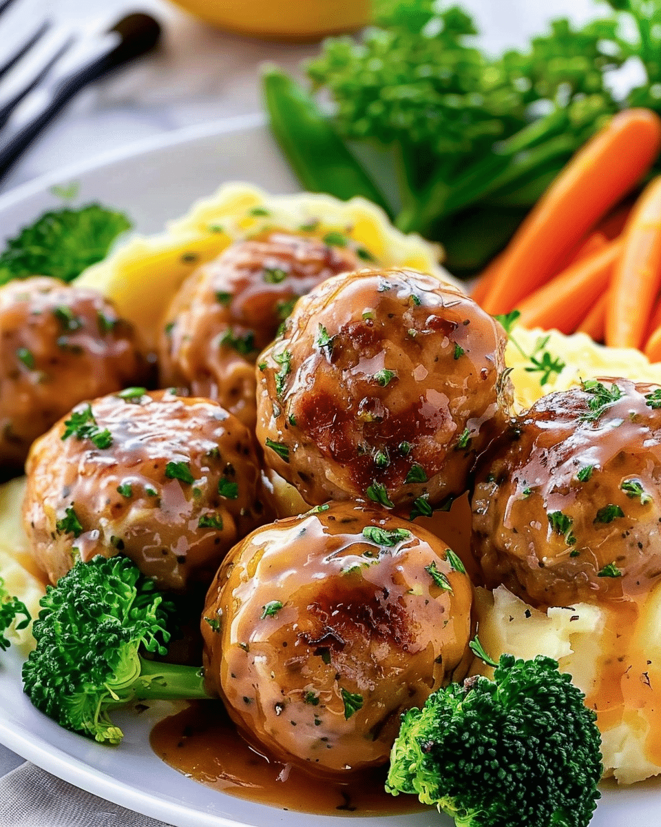 Meatballs with Mashed Potatoes, Steamed Broccoli, and Carrots