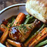 Honey-Glazed Drumsticks with Garlic Butter Veggies and Soft Roll