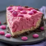 The Best Pink M&M Snickers Cheesecake