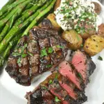Smoked Ribeye with Loaded Potato and Asparagus