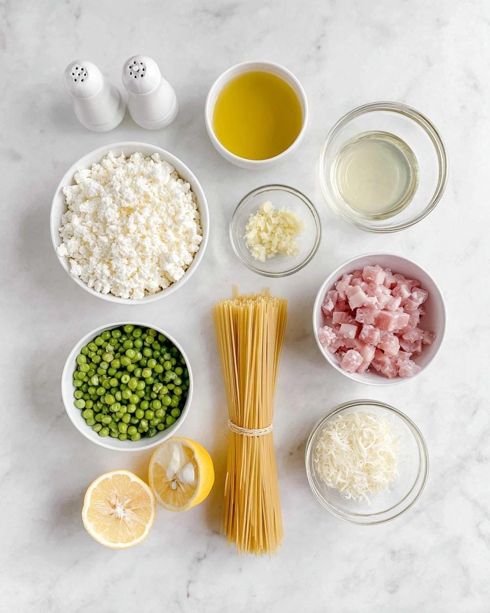 A white marbled surface holds an arrangement of cooking ingredients: starting from the top left, a white bowl filled with crumbly white cheese, next to it on the right a white bowl with light golden liquid; below these, a small clear glass bowl with minced garlic, and to the right a white bowl filled with small pink cubes of raw meat. Below, from left to right, there is a white bowl with frozen green peas, a bunch of uncooked pasta sticks tied together placed vertically in the center, and a clear glass bowl with a small amount of clear liquid. On the bottom right, there are two halves of a lemon, below them a white bowl filled with finely grated cheese, and to the lower left, a small clear glass bowl with chopped shallots. Two white salt and pepper shakers are placed near the top left. Photo taken with an iphone --ar 4:5 --v 7