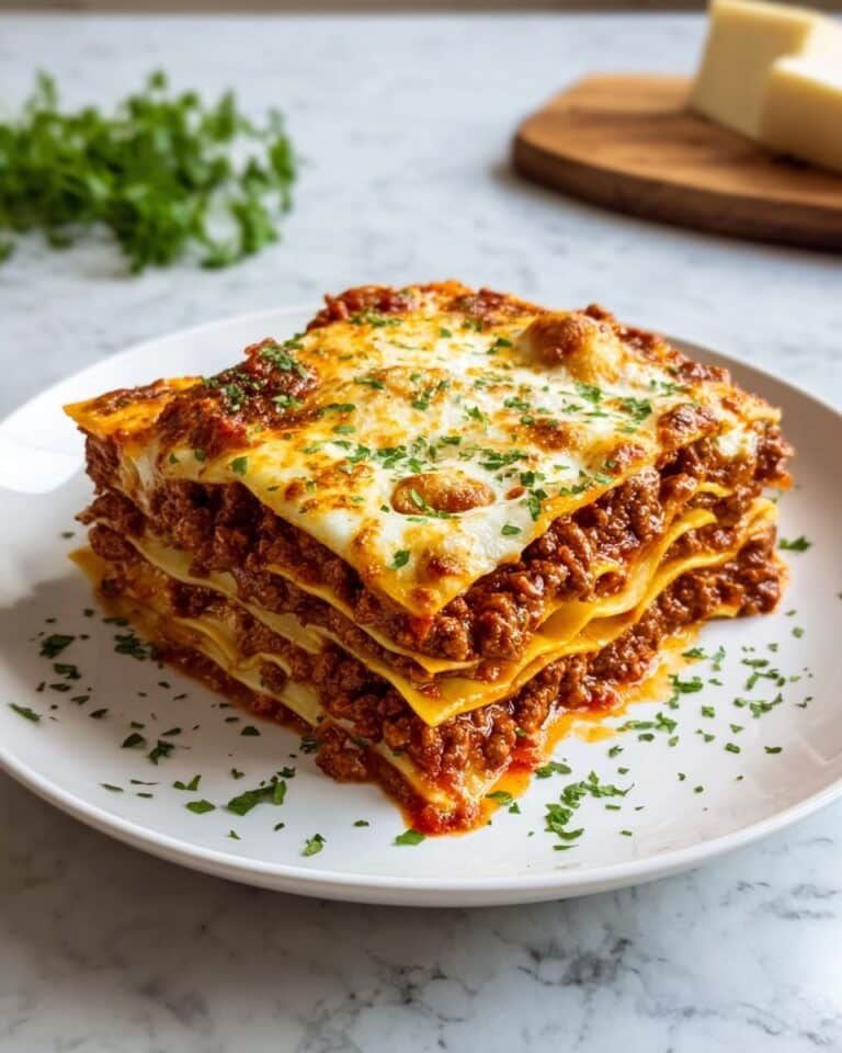 Hearty Beef Lasagna with Creamy Ricotta Layers Recipe