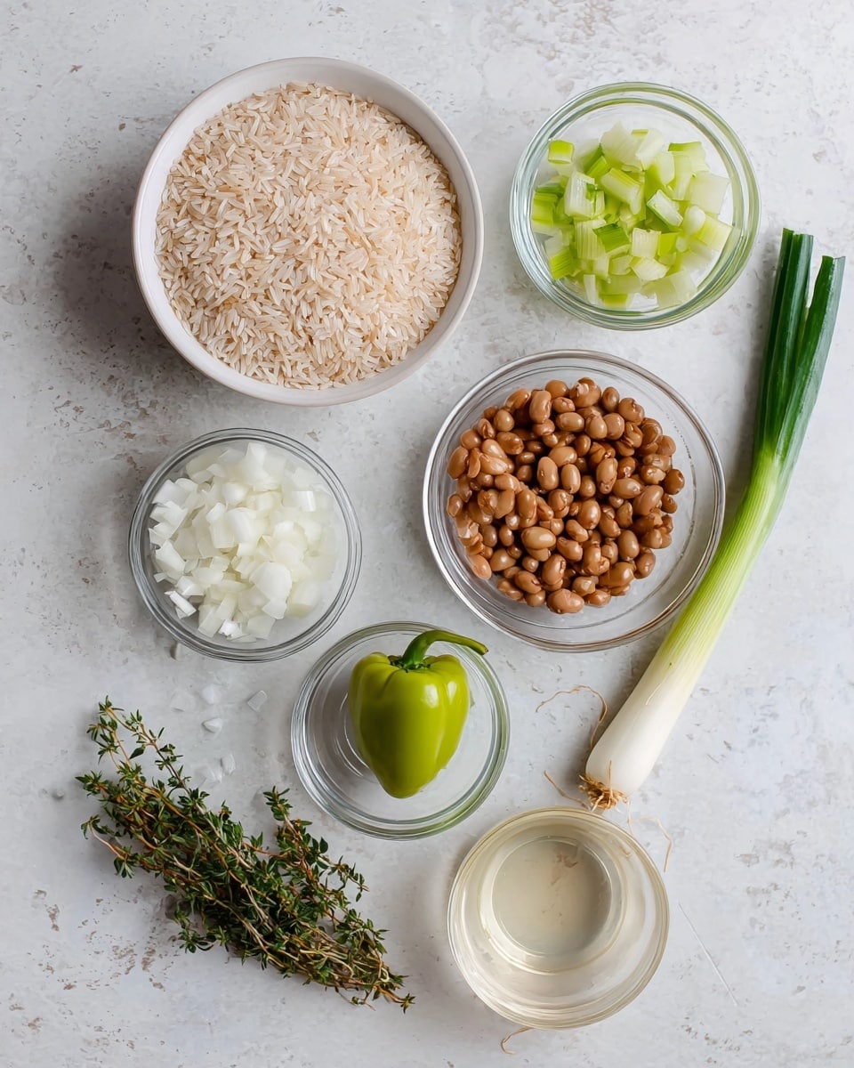 The image shows seven ingredients arranged on a white marbled surface. At the top center is a white bowl filled with dry rice grains. To its right is a small glass bowl with chopped garlic and celery. Below that is a white bowl filled with brown beans. Near the bottom center is a small glass bowl with a clear liquid. To the left of the rice bowl is another small glass bowl holding chopped white onions. Below it is a whole green scotch bonnet pepper, a sprig of fresh thyme, and a single long green onion. The ingredients are spaced evenly in a neat arrangement. Photo taken with an iphone --ar 4:5 --v 7