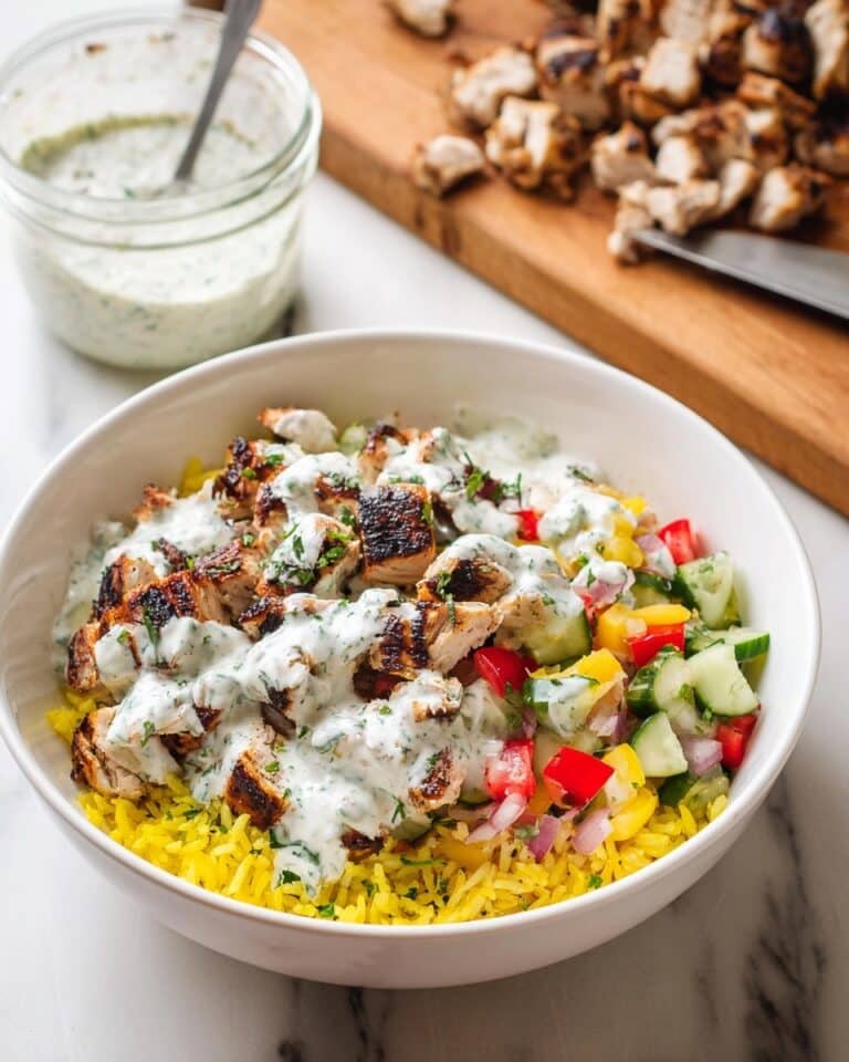 Halal Cart Chicken with Spiced Rice and Creamy White Sauce Recipe