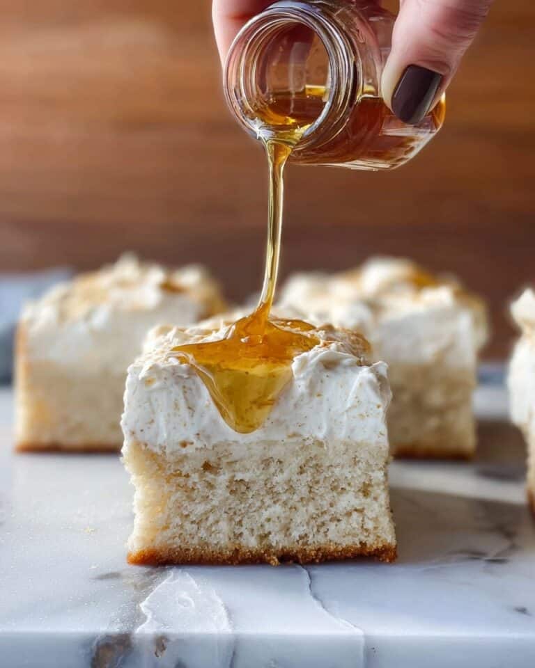 Creamy Coconut Cake with Pastry Cream and Fluffy Whipped Frosting Recipe